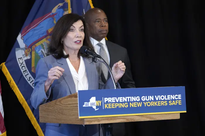New York Governor Kathy Hochul speaks, joined by New York City Mayor Eric Adams (R) and the newly appointed ATF Director Steve Dettelbah, as she delivers remarks about their joint effort to combat gun violence at the High Intensity Drug Trafficking Areas (HIDTA) office in August. Adams has an 11-point proposal to address mental health in New York City, which requires the state's help.